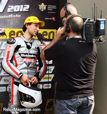 Winner Riccardo Moretti gives interviews at Moto3 Italian Championship