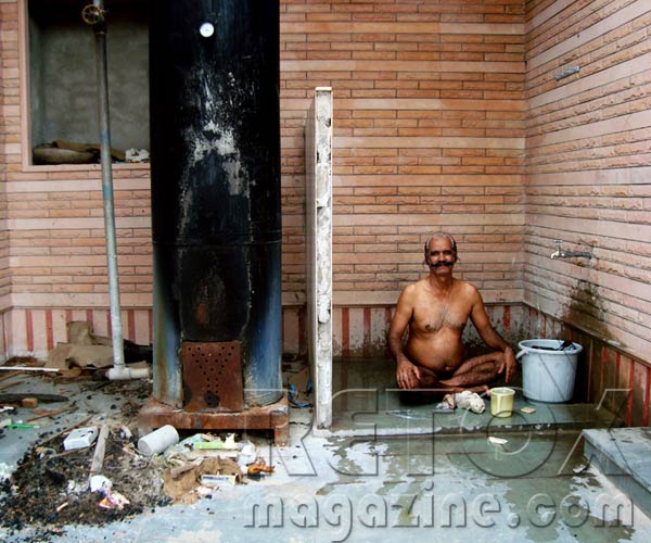 man washing clothes india